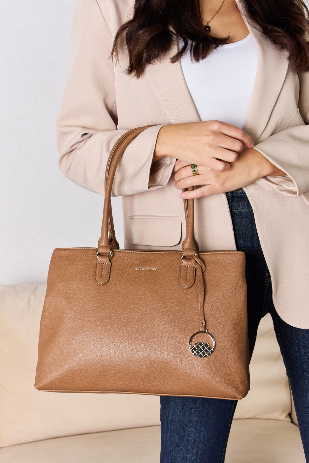 David Jones Structured Leather HandbagThe sleek lines and classic design exude a refined charm suitable for any occasion. The supple yet sturdy faux leather exterior not only replicates the luxurious feeDavid Jones Structured Leather HandbagDavid Jones Structured Leather Handbag