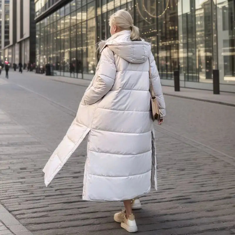 Lisa™ Long Winter Jacket With a Loose FitStep into winter with grace and sophistication with the Lisa Long Winter Coat With a Loose Fit. Designed to elevate your cold-weather style, this coat is more than jLisa™ Long Winter JacketCoatsLisa™ Long Winter Jacket