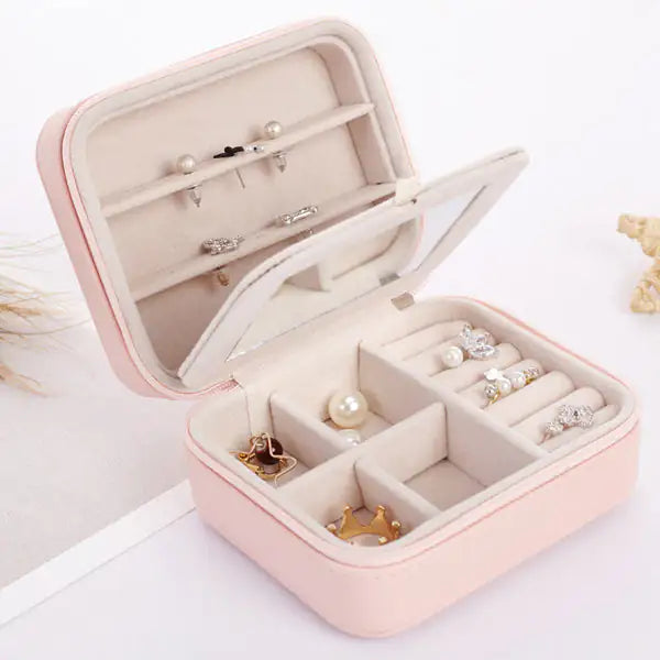 Cool Jewels A Palm Sized Compact Jewelry BoxGood things come in small packages, just like this Cool Jewels Jewelry Box!

Keep your precious jewelry safe and close at hand. Designed to fit in your palm, this coPalm Sized Compact Jewelry BoxJewelry BoxPalm Sized Compact Jewelry Box