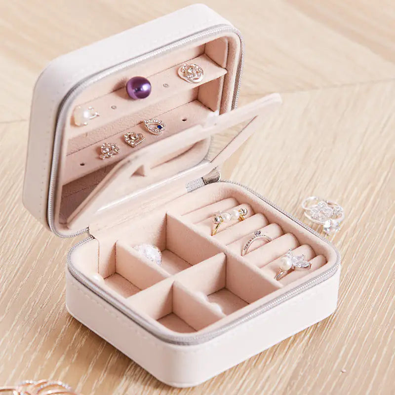 Cool Jewels A Palm Sized Compact Jewelry BoxGood things come in small packages, just like this Cool Jewels Jewelry Box!

Keep your precious jewelry safe and close at hand. Designed to fit in your palm, this coPalm Sized Compact Jewelry BoxJewelry BoxPalm Sized Compact Jewelry Box