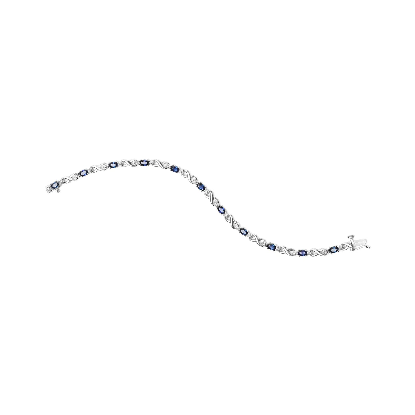 10K White Gold Blue Sapphire & Diamond X-Link Bracelet – Timeless ElegEmbrace timeless elegance with this 10K White Gold Blue Sapphire &amp; Diamond X-Link Bracelet. Featuring vibrant blue sapphires paired with sparkling diamonds, the 10K White Gold Blue Sapphire & DiamondBracelet10K White Gold Blue Sapphire & Diamond