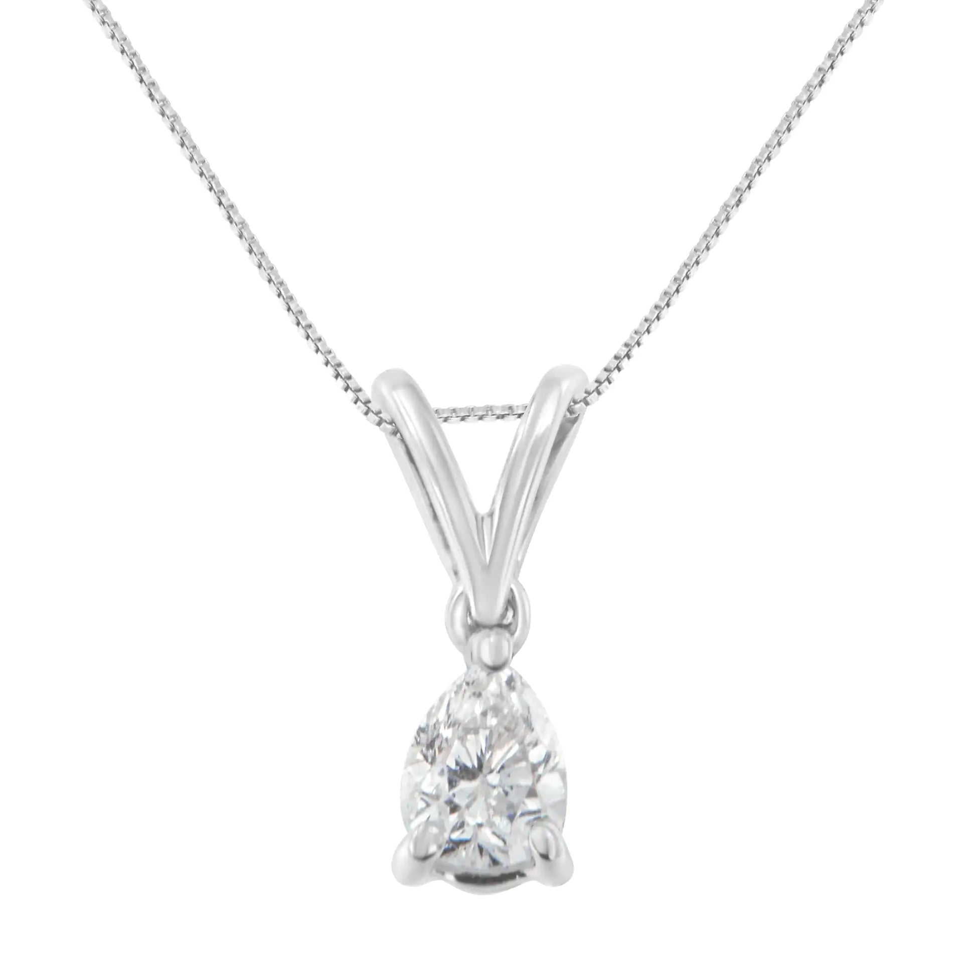 10K white gold 1/5 cttw diamond pear pendant necklace on chain.