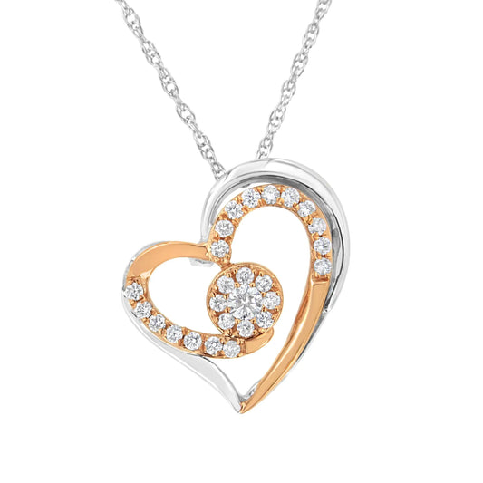 10k rose and white gold heart pendant with lab grown diamonds on sterling silver chain.