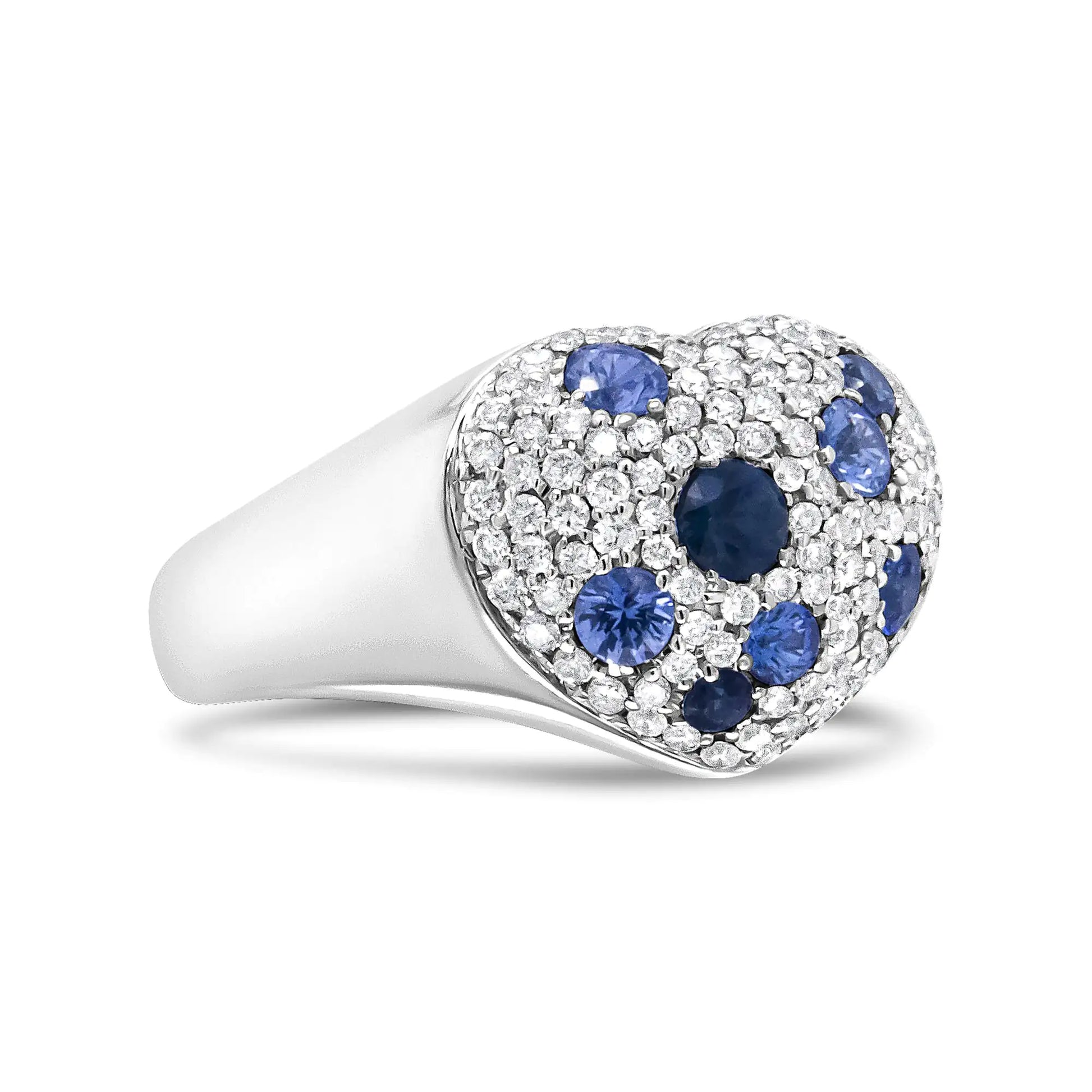 18K White Gold Blue Sapphire and 5/8 Cttw Diamond Cluster Heart ShapedThis piece embodies the phrase "a heart of gold." A beautiful cluster of natural white diamonds is the central motif of this 18k white gold ring. The cluster also ha18K White Gold Blue SapphireRings18K White Gold Blue Sapphire