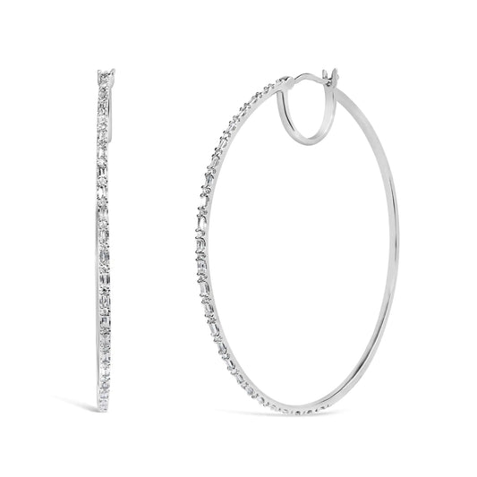 10K white gold diamond hoop earrings with baguette and round stones, 1/2 cttw.