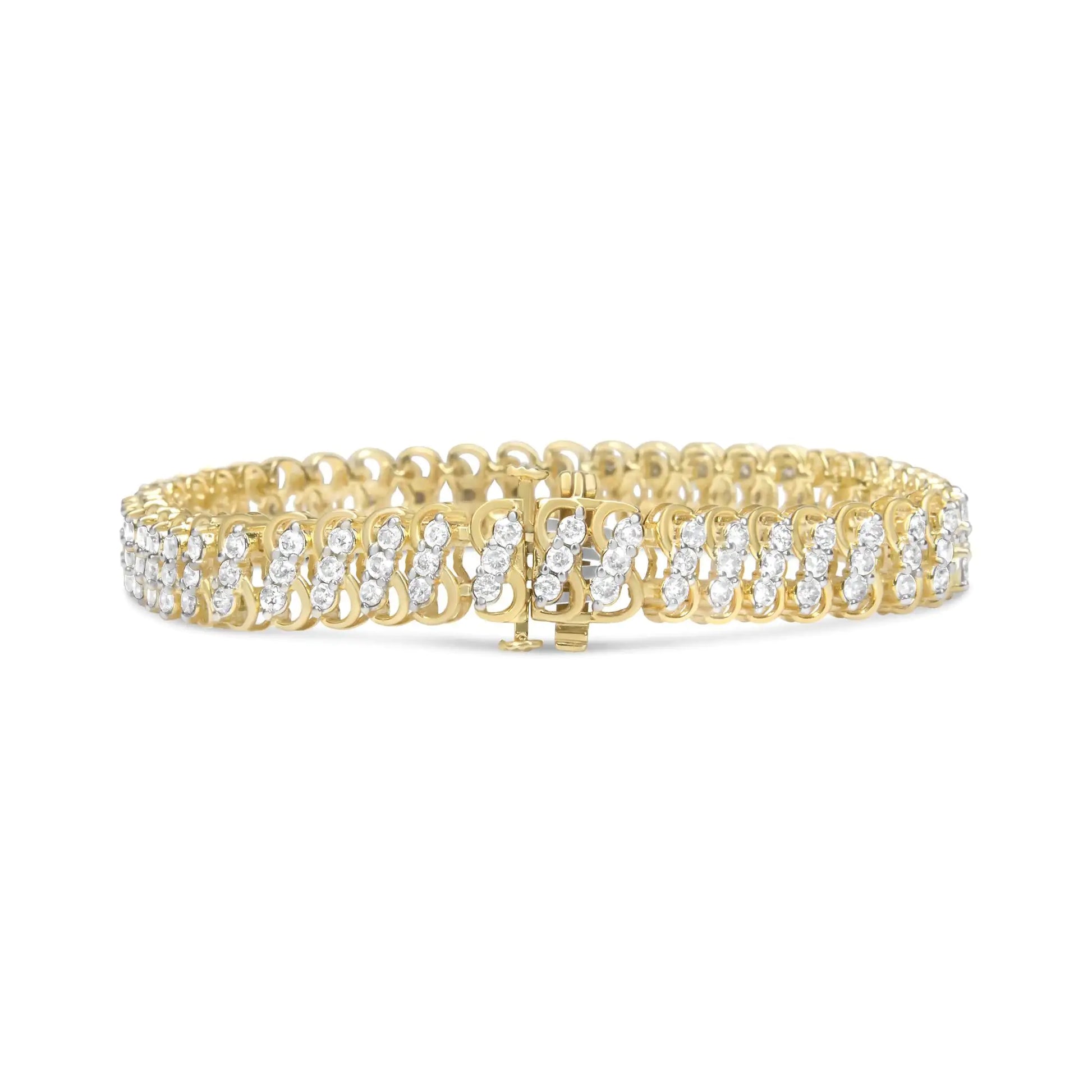 10K Yellow Gold Triple-Row Diamond Tennis Bracelet – 4.00 CaratsDazzle with this 10K Yellow Gold Triple-Row Diamond Tennis Bracelet, showcasing 4.00 carats of radiant diamonds arranged in a luxurious three-row design. The brillia10K Yellow Gold Triple-Row Diamond Tennis Bracelet – 4Bracelet10K Yellow Gold Triple-Row Diamond Tennis Bracelet – 4