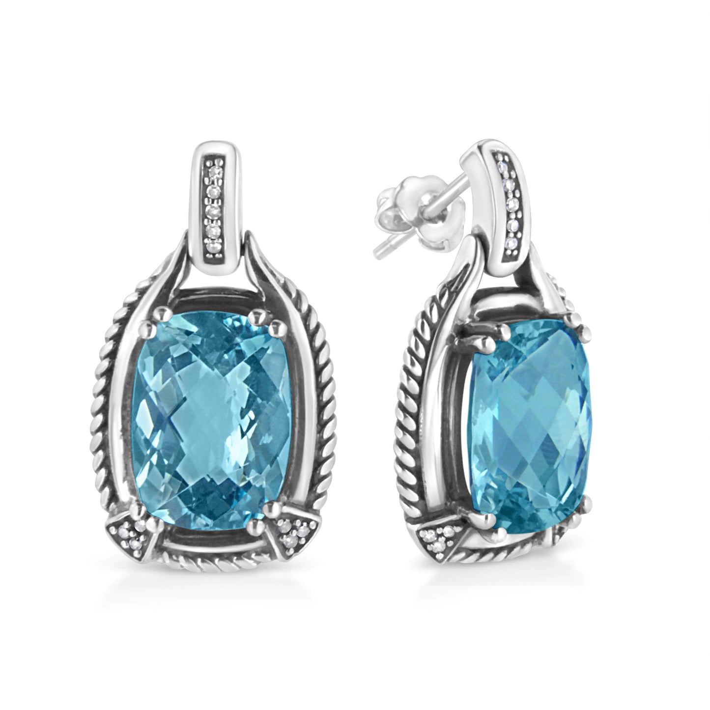 Sterling Silver Cushion Cut Blue Topaz Gemstone and Diamond Accent DanThese mesmeric blue topaz and diamond earrings is a sweet illumination for her ears. Styled in luminous sterling silver these ravishing earrings is jeweled with a laSterling Silver Cushion Cut Blue Topaz GemstoneEarringsSterling Silver Cushion Cut Blue Topaz Gemstone