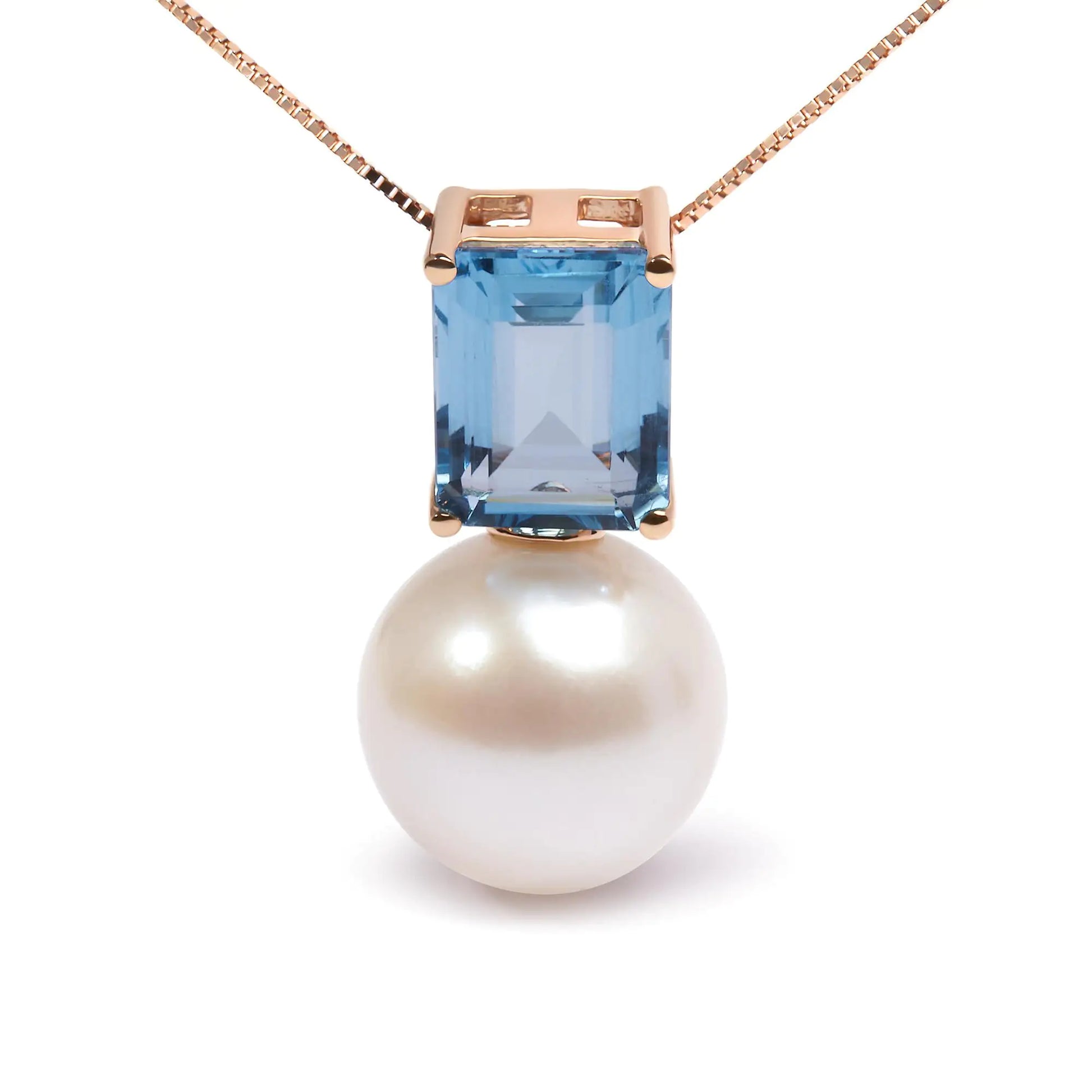 14K Rose Gold Pearl and Swiss Blue Topaz Pendant NecklaceThis exquisite 14K Rose Gold Pendant Necklace features a stunning combination of a lustrous pearl and Swiss blue topaz, totaling 3 1/3 carats. The elegant design is Swiss Blue Topaz Pendant NecklaceNecklacesSwiss Blue Topaz Pendant Necklace