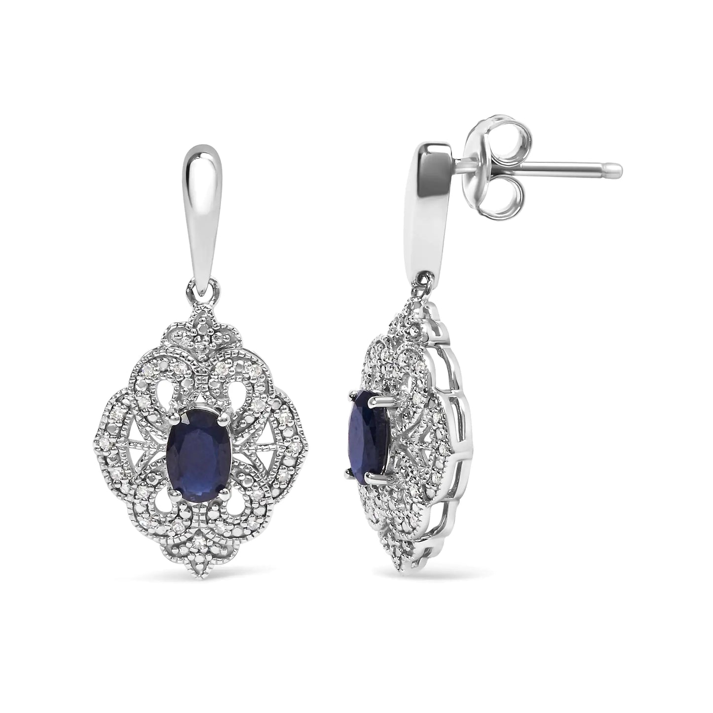 Sterling Silver Oval Blue Sapphire and White Diamond Accent Art Deco SEmbark on a journey of timeless elegance with these exquisite Art Deco-inspired shield dangle earrings. Crafted from the finest .925 sterling silver, they showcase tWhite Diamond Accent Art Deco Style Shield Dangle EarringWhite Diamond Accent Art Deco Style Shield Dangle Earring