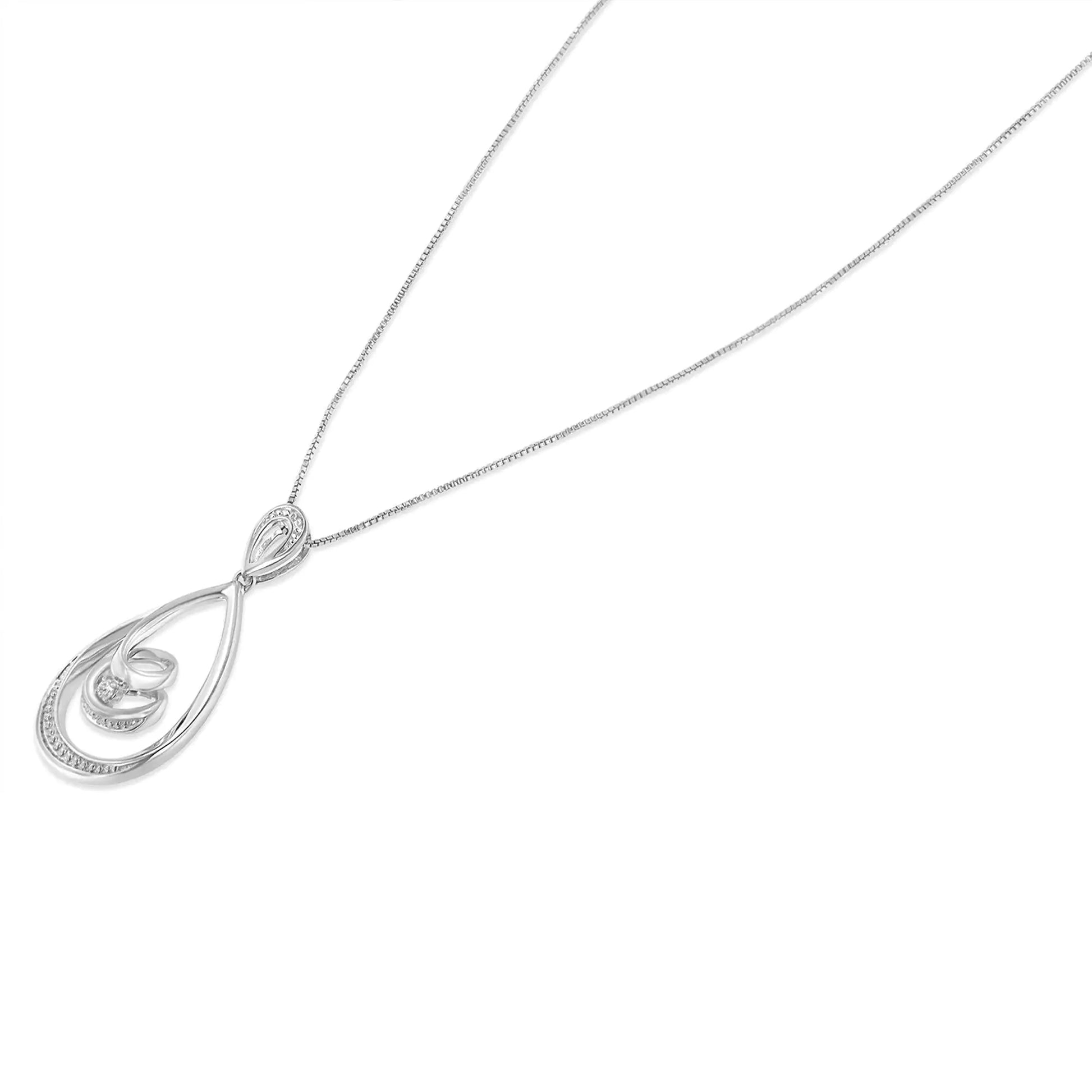 10K White Gold Diamond Accented Open Teardrop Twisted Curl 18" PendantYou'll be captivated by this magical style. Let everyone adore your gorgeous looks with this beautiful pendant. The pendant is crafted of 10 karats white gold and is10K White Gold Diamond Accented Open Teardrop Twisted Curl 18" Pendant Necklace Necklace10K White Gold Diamond Accented Open Teardrop Twisted Curl 18" Pendant Necklace 