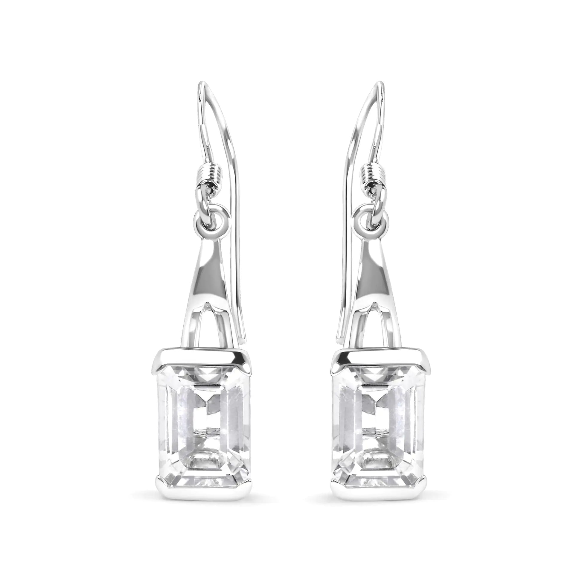 Sterling silver emerald cut white topaz solitaire dangle earrings with lever-back.