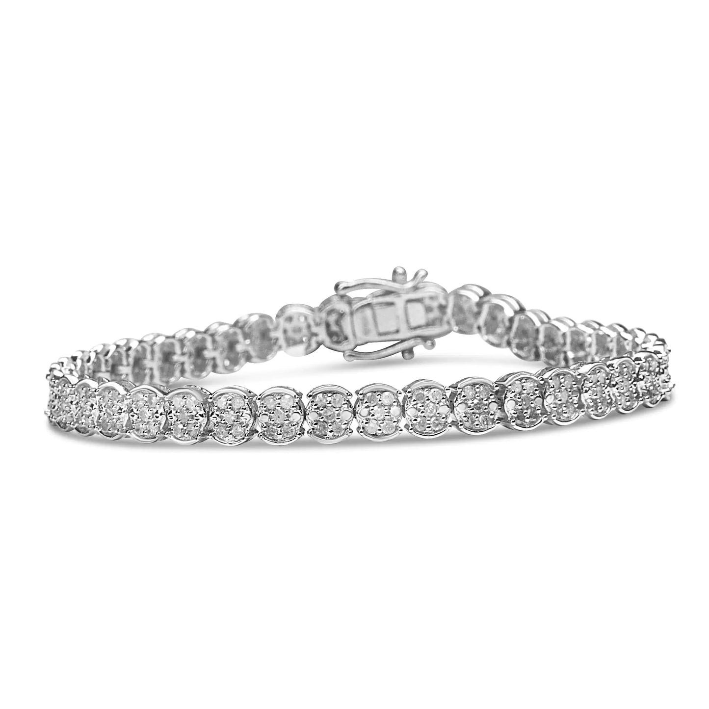 Sterling Silver Diamond Cluster Link BraceletA sparkling enchantment of diamonds creates glistening beauty in this cluster link bracelet. This bracelet radiates modern glamour, perfectly prepared with round diaSterling Silver Diamond Cluster Link BraceletSterling Silver Diamond Cluster Link Bracelet