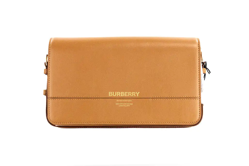 Burberry Grace Small Nutmeg Leather Flap Crossbody Clutch HandbagAdd a touch of timeless elegance to your wardrobe with the Burberry Grace Small Nutmeg Leather Flap Crossbody Clutch Handbag. Crafted from premium nutmeg-toned leathBurberry Grace Small Nutmeg Leather Flap Crossbody Clutch HandbagBurberry Grace Small Nutmeg Leather Flap Crossbody Clutch Handbag