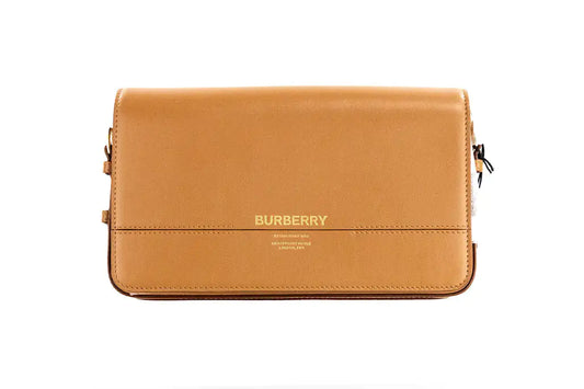 Burberry Grace Small Nutmeg Leather Flap Crossbody Clutch HandbagAdd a touch of timeless elegance to your wardrobe with the Burberry Grace Small Nutmeg Leather Flap Crossbody Clutch Handbag. Crafted from premium nutmeg-toned leathBurberry Grace Small Nutmeg Leather Flap Crossbody Clutch HandbagBurberry Grace Small Nutmeg Leather Flap Crossbody Clutch Handbag