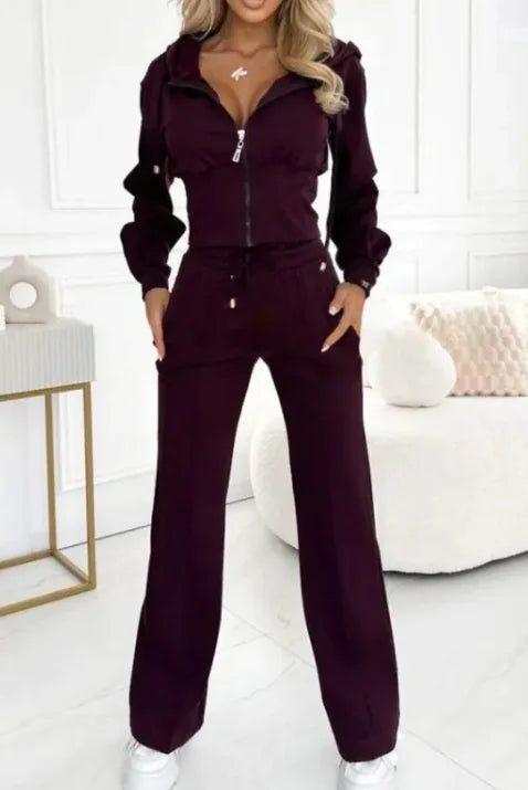 Hooded Zipper Jacket with Tight-Fitting Bottom SetThis stylish two-piece set combines a cozy hooded zipper jacket with tight-fitting pants, perfect for chilly fall and winter weather. The solid color design offers aHooded Zipper JacketPantsHooded Zipper Jacket