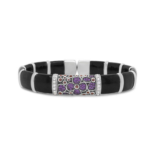 925 sterling silver floral bangle bracelet with black enamel, pink and orange sapphires, and round diamonds.