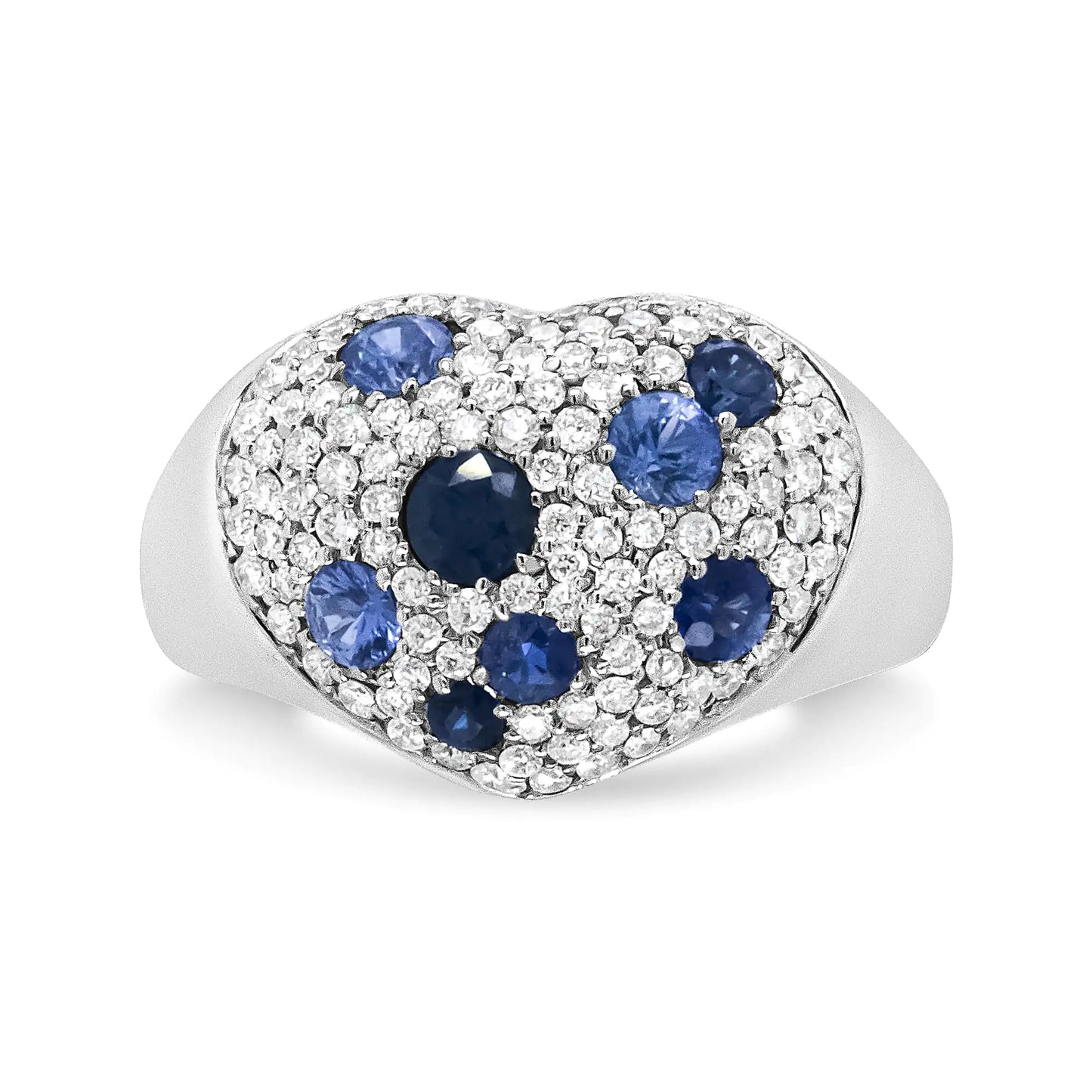 18K white gold heart-shaped ring with blue sapphires and diamond cluster.