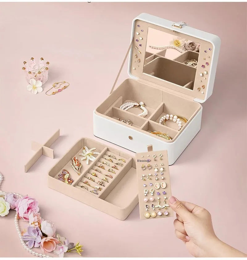 Clamshell Large Capacity Jewelry Box With Sandwich MirrorOrganize and Shine with the Clamshell Large Capacity Jewelry Box with Sandwich Mirror

Keep your jewelry collection beautifully organized and easily accessible with Clamshell Large Capacity Jewelry BoxJewelry BoxClamshell Large Capacity Jewelry Box