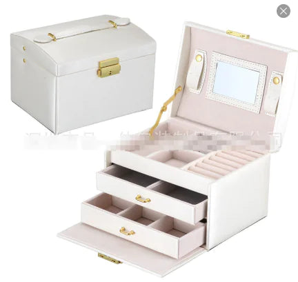 Clamshell Large Capacity Jewelry Box With Sandwich MirrorOrganize and Shine with the Clamshell Large Capacity Jewelry Box with Sandwich Mirror

Keep your jewelry collection beautifully organized and easily accessible with Clamshell Large Capacity Jewelry BoxJewelry BoxClamshell Large Capacity Jewelry Box