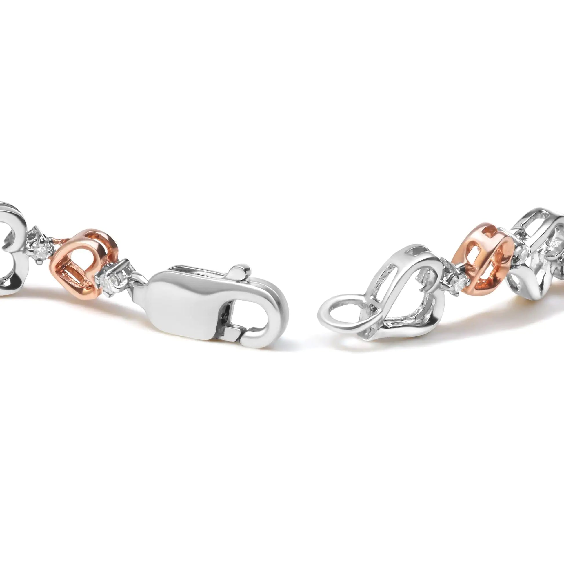 14K Rose Gold Plated .925 Sterling Silver 1/4 Cttw Diamond Heart Link Introducing a stunning and romantic piece of jewelry, perfect for showing your love and affection. This beautiful 14K rose gold plated sterling silver heart link bra14K Rose Gold Plated14K Rose Gold Plated