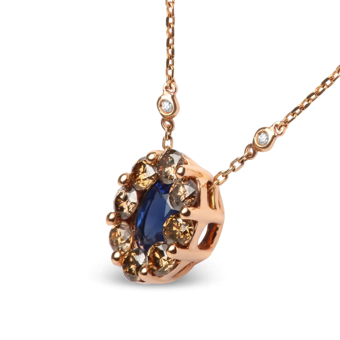 18K Rose Gold White and Brown Diamond Gemstone Necklace Oval Blue SappElevate your style with this stunning 18k rose gold station necklace, perfect for any occasion. Featuring a captivating 7 x 4mm oval heat-treated blue sapphire set i18K Rose Gold White and Brown Diamond Gemstone Necklace18K Rose Gold White and Brown Diamond Gemstone Necklace