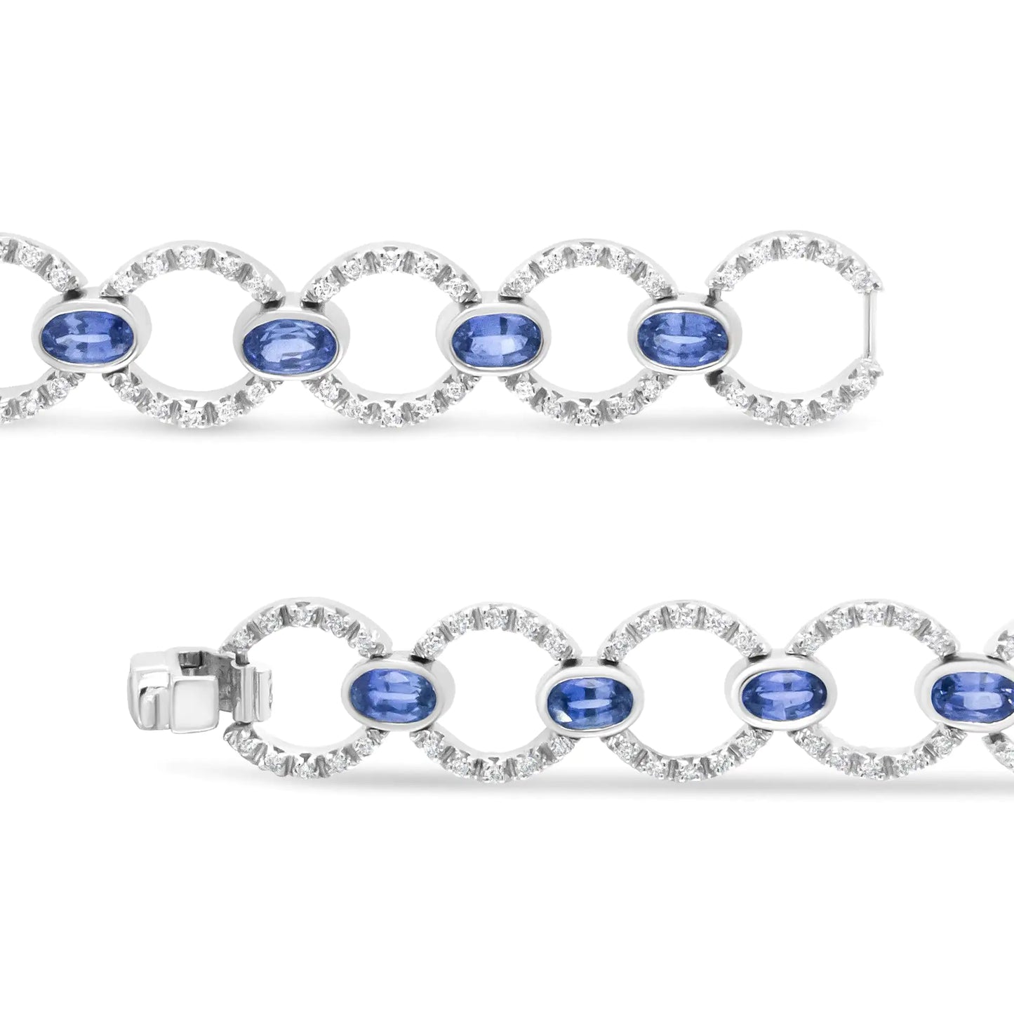 18K White Gold 6 Cttw Diamond and 5x3mm Oval Blue Sapphire Openwork CiThis luxury18k white gold link bracelet showcases a shimmering circle links set with glorious round white diamonds in prong settings. These sparkling stones total 6 5x3mm Oval Blue Sapphire Openwork Circle Link Bracelet 5x3mm Oval Blue Sapphire Openwork Circle Link Bracelet 