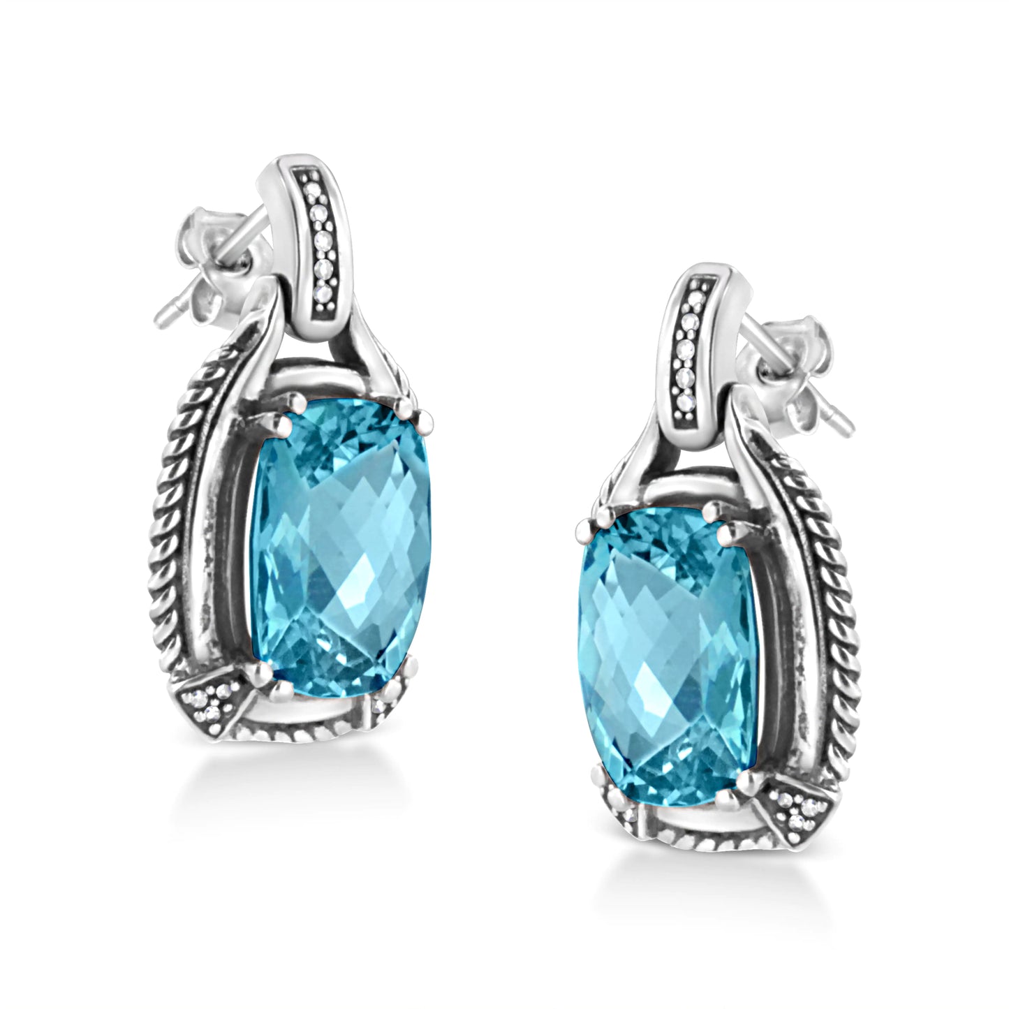 Sterling Silver Cushion Cut Blue Topaz Gemstone and Diamond Accent DanThese mesmeric blue topaz and diamond earrings is a sweet illumination for her ears. Styled in luminous sterling silver these ravishing earrings is jeweled with a laSterling Silver Cushion Cut Blue Topaz GemstoneEarringsSterling Silver Cushion Cut Blue Topaz Gemstone