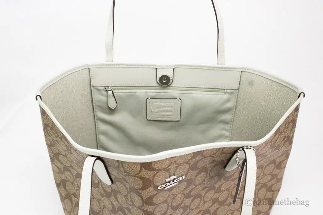 Coach (5696) Khaki Light Sage Coated Canvas City Tote Shoulder HandbagCoach City Tote Shoulder Handbag – Khaki Light Sage Coated Canvas Effortlessly chic, the Coach City Tote in khaki light sage coated canvas is perfect for your everydCoach 5696 Khaki Light Sage Coated Canvas City Tote Shoulder Handbag PurseCoach 5696 Khaki Light Sage Coated Canvas City Tote Shoulder Handbag Purse