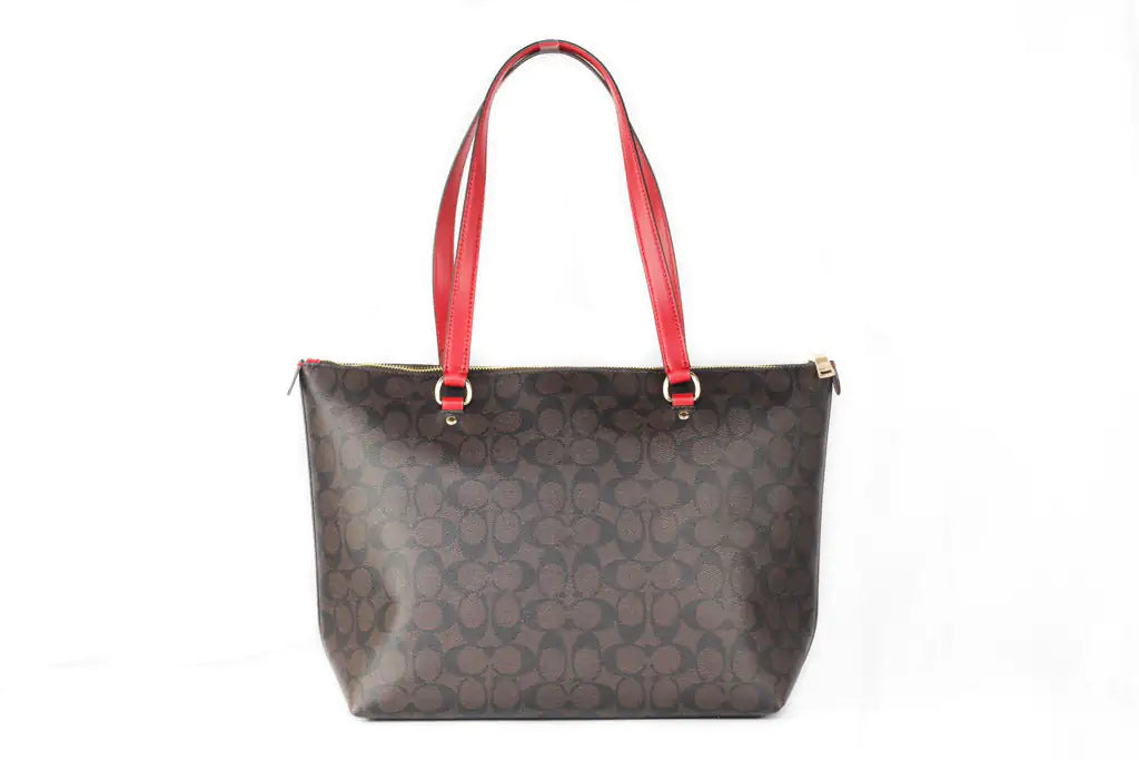 Coach (79609) Signature Canvas Brown Red Leather Gallery Tote Handbag Coach Gallery Tote Handbag – Signature Canvas Brown with Red Leather AccentsMake a bold statement with the Coach Gallery Tote Handbag in signature canvas brown with Coach 79609 Signature Canvas Brown Red Leather Gallery Tote Handbag PurseCoach 79609 Signature Canvas Brown Red Leather Gallery Tote Handbag Purse