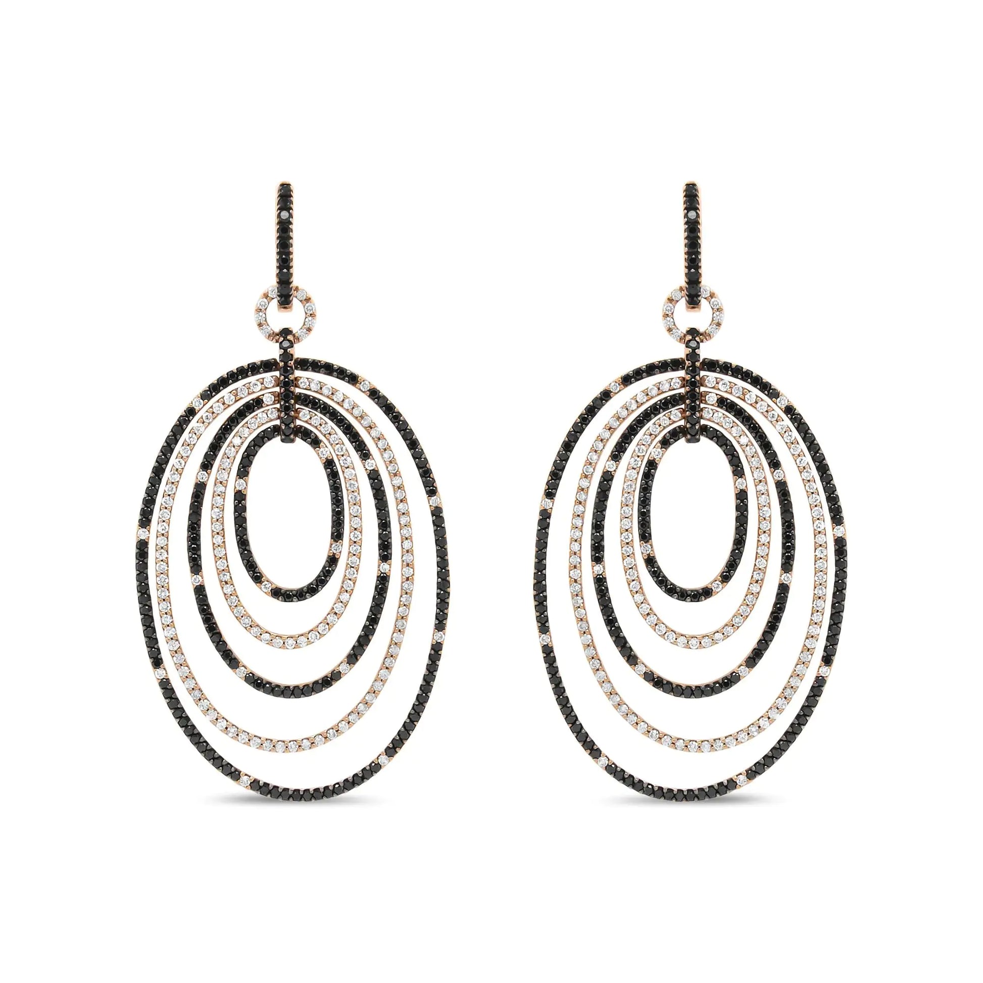 18K Rose Gold 5.00 Cttw Round Black and White Diamond Graduated Hoop DMake a statement with these stunning 18K Rose Gold Graduated Hoop Dangle Earrings, featuring 5.00 cttw of brilliant round black and white diamonds. The earrings' uniWhite Diamond Graduated Hoop Dangle EarringsEarringsWhite Diamond Graduated Hoop Dangle Earrings