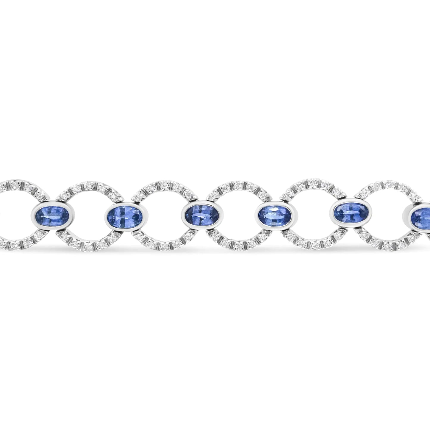 18K White Gold 6 Cttw Diamond and 5x3mm Oval Blue Sapphire Openwork CiThis luxury18k white gold link bracelet showcases a shimmering circle links set with glorious round white diamonds in prong settings. These sparkling stones total 6 5x3mm Oval Blue Sapphire Openwork Circle Link Bracelet 5x3mm Oval Blue Sapphire Openwork Circle Link Bracelet 