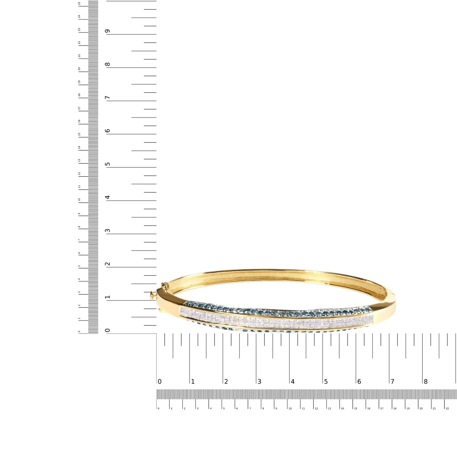 14K Yellow Gold 2.0 Cttw Treated Blue and White Diamond Bangle BraceleIndulge in the beauty of this 14K Yellow Gold Bangle Bracelet adorned with 142 Natural Princess-cut Diamonds totaling 2.0 Cttw. The treated Blue and White Diamonds a14K Yellow Gold 214K Yellow Gold 2