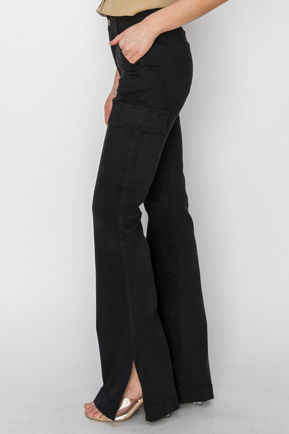 RISEN Full Size High Rise Side Slit Cargo Bootcut JeansElevate your denim game with these high-rise side slit cargo bootcut jeans. The unique design features a flattering high waist and a trendy bootcut leg silhouette. TRISEN Full Size High Rise Side Slit Cargo Bootcut JeansRISEN Full Size High Rise Side Slit Cargo Bootcut Jeans