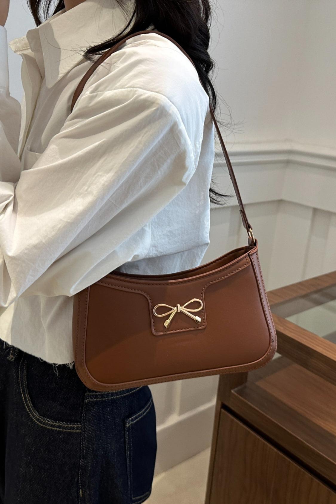 Bow Trim PU Leather Shoulder BagBow Trim PU Leather Shoulder Bag is a perfect blend of style and functionality. Crafted from high-quality elastomer and PU materials, this purse is designed to withsBow Trim PU Leather Shoulder BagBagBow Trim PU Leather Shoulder Bag