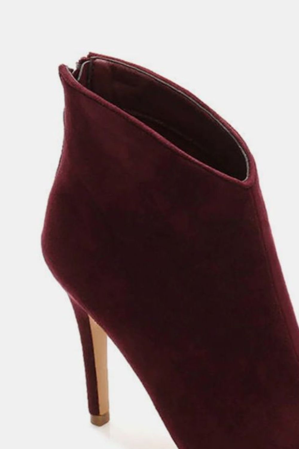 Beast Fashion Suede Stiletto Ankle Booties with Back ZippersSuede stiletto ankle booties with back zippers are a sleek and stylish footwear choice that combines the luxurious texture of suede with the edgy appeal of stiletto Beast Fashion Suede Stiletto Ankle BootiesBeast Fashion Suede Stiletto Ankle Booties