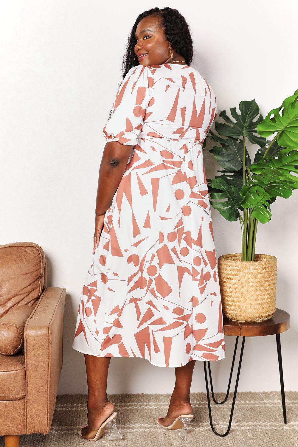 Printed Surplice Balloon Sleeve DressThis printed dress features a surplice neckline for an elegant and flattering look. The balloon sleeves add a touch of whimsy and playfulness to the dress. With its Printed Surplice Balloon Sleeve DressDressesPrinted Surplice Balloon Sleeve Dress