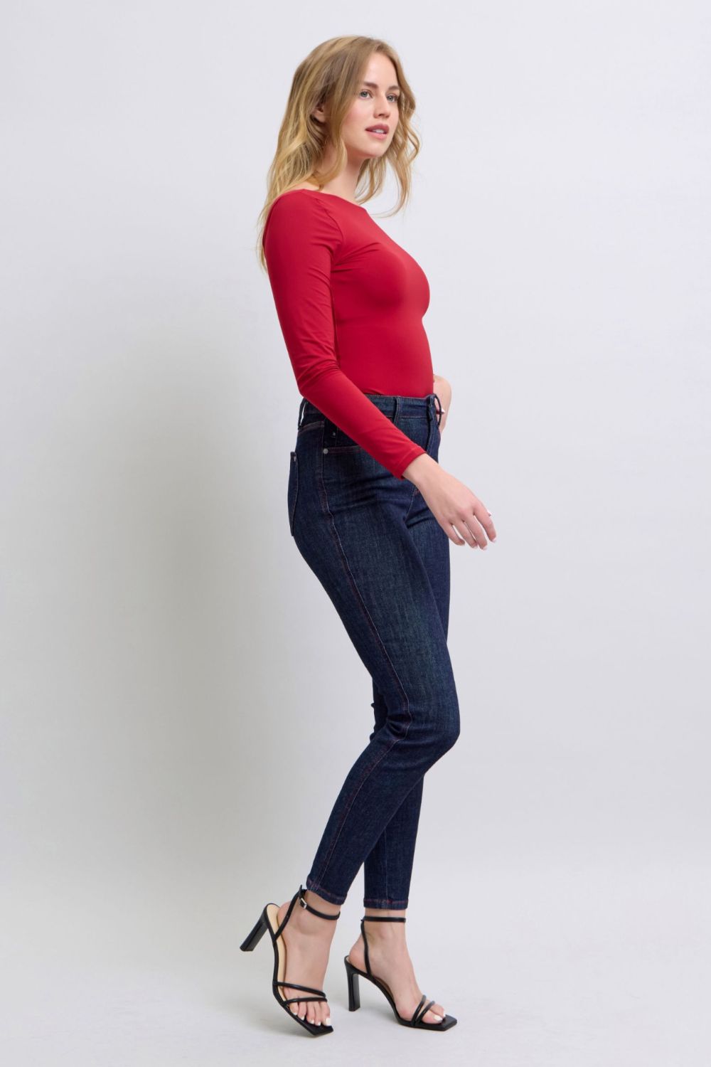 Judy Blue Full Size Heart Shaped Back Pockets Skinny JeansHigh Rise Heart-shaped back pockets on skinny jeans add a fun and playful twist to a classic style. These unique pockets can enhance your silhouette and create a flaJudy Blue Full Size Heart Shaped Back Pockets Skinny JeansJudy Blue Full Size Heart Shaped Back Pockets Skinny Jeans