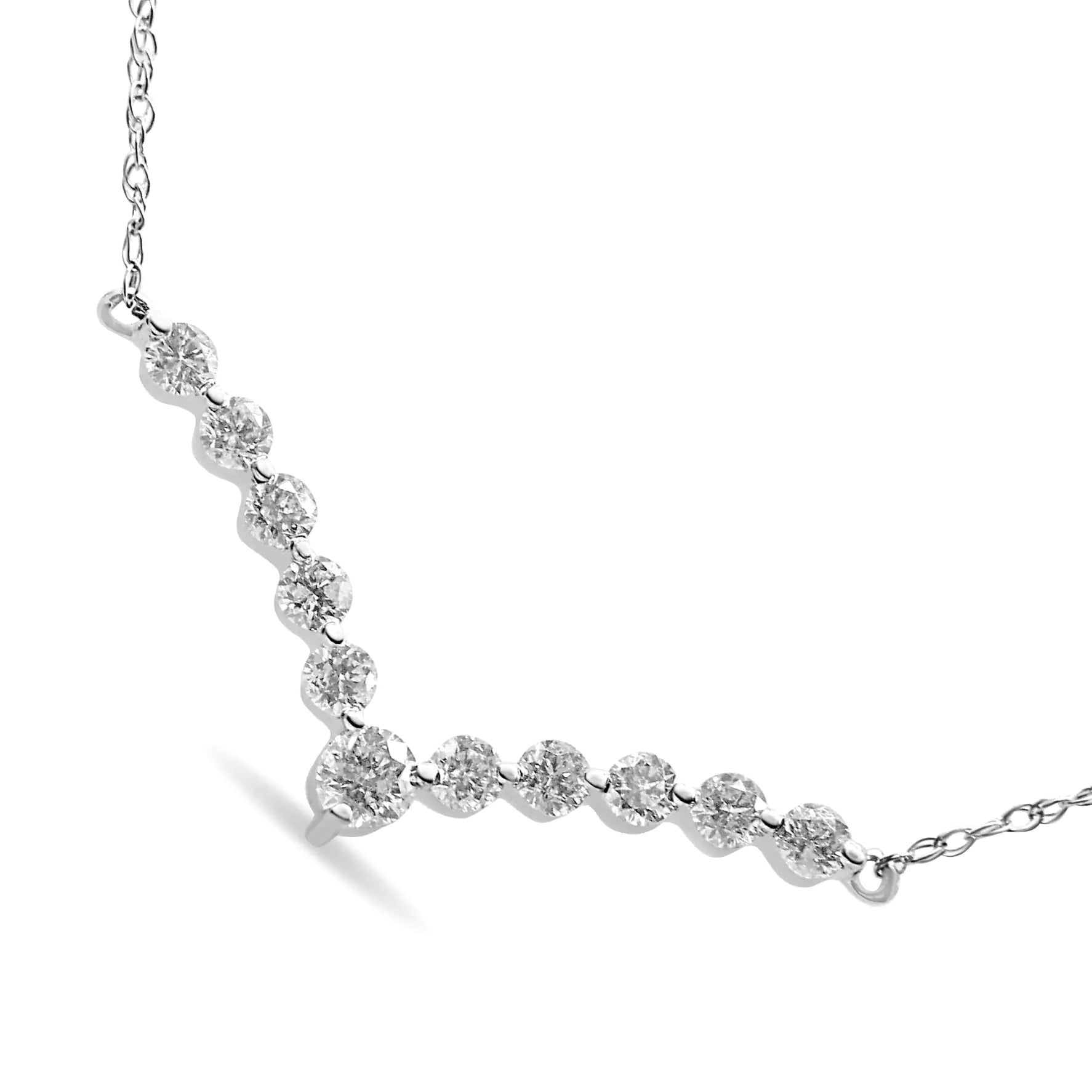 10K White Gold 1/2 Cttw Round-Cut Diamond "V" Shaped 18" Necklace (H-IClassic and elegant, this 10k white gold necklace showcases 1/2ct of prong set, glimmering round cut diamonds. 11 set diamonds create a "V" shape that softly hangs f10K White Gold 12 Cttw Round-Cut Diamond "Necklace10K White Gold 12 Cttw Round-Cut Diamond "