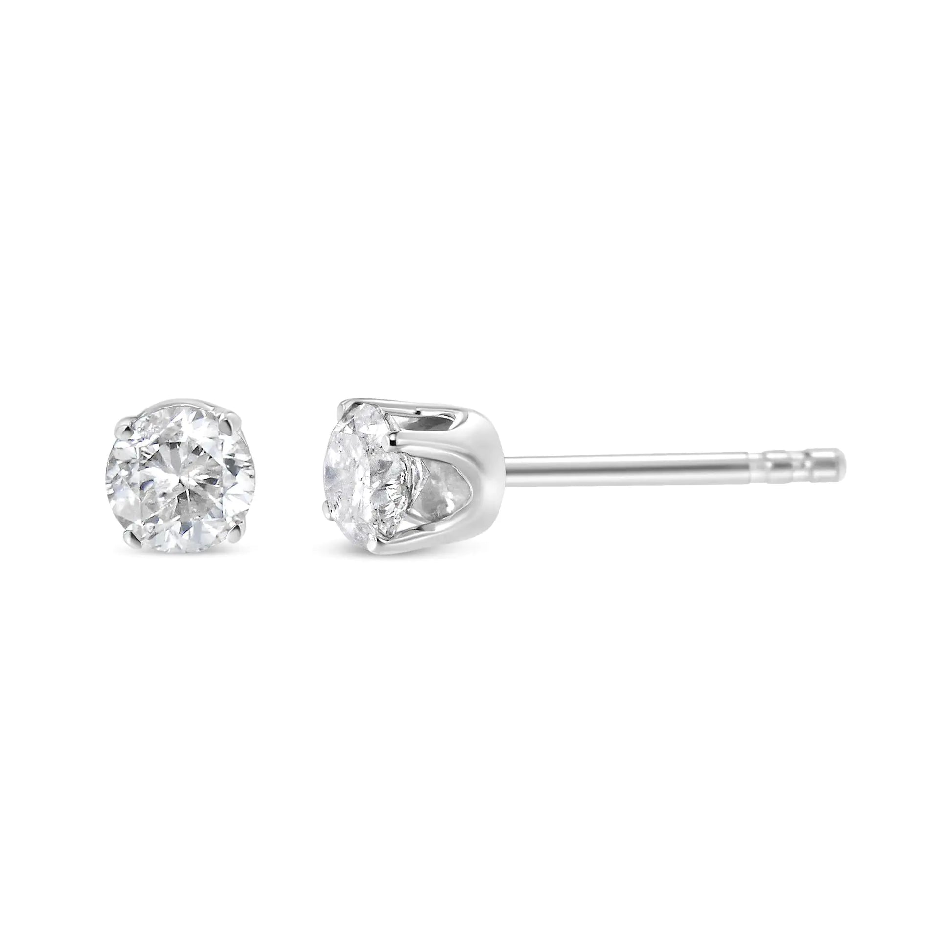 AGS Certified 14K White Gold 1.0 Cttw 4-Prong Set Brilliant Round-Cut Celebrate any occasion with these classic shimmering diamond stud earrings. Crafted from 14k white gold each earring showcases a sparklingm brilliant round-cut solitAGS Certified 14K White Gold 1EarringsAGS Certified 14K White Gold 1