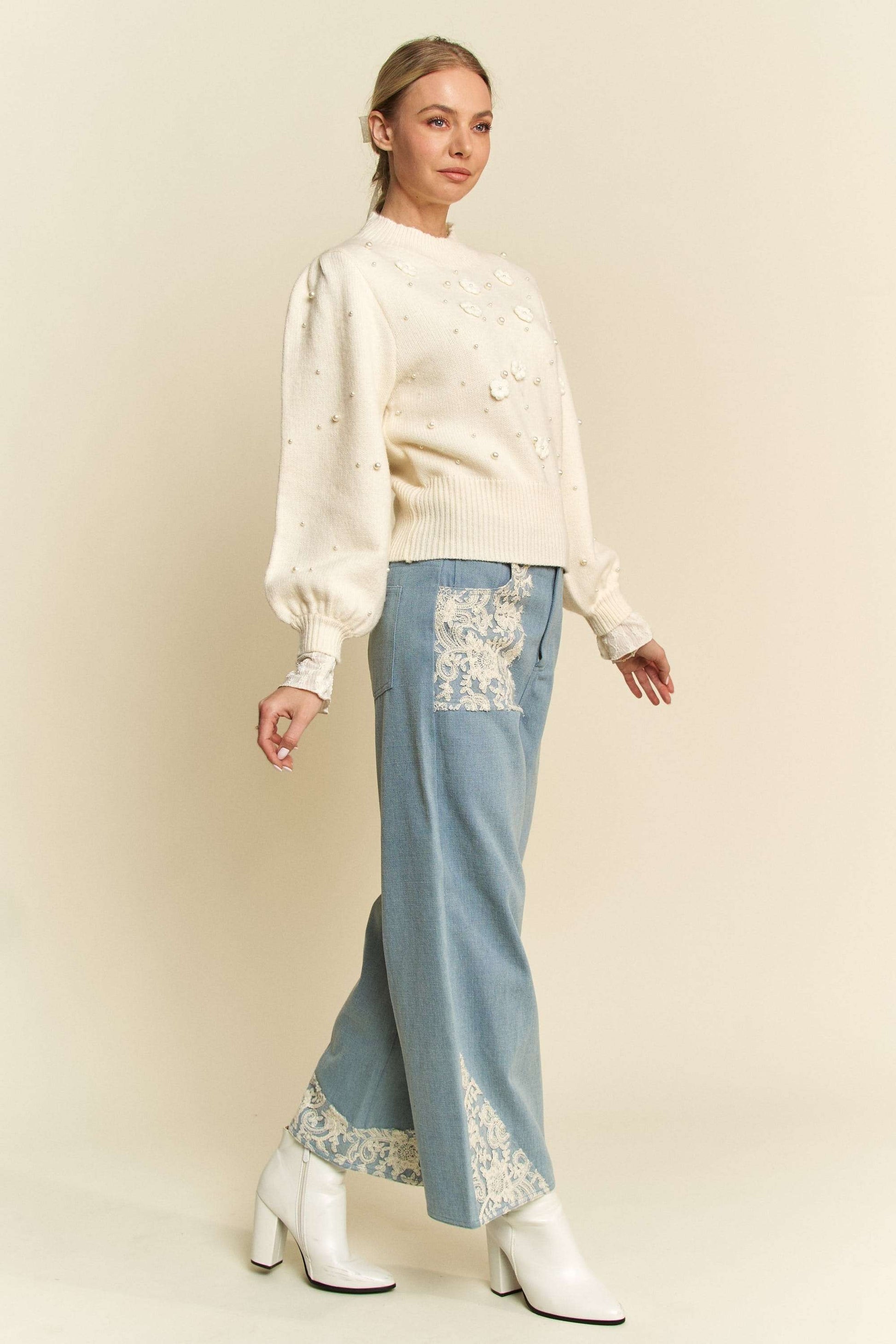 Davi & Dani Lace Applique Wide Leg JeansThese Lace Applique Wide Leg Jeans are the perfect statement piece for any fashion-forward individual. The delicate lace detailing adds a touch of femininity to thesDavi & Dani Lace Applique Wide Leg JeansDavi & Dani Lace Applique Wide Leg Jeans