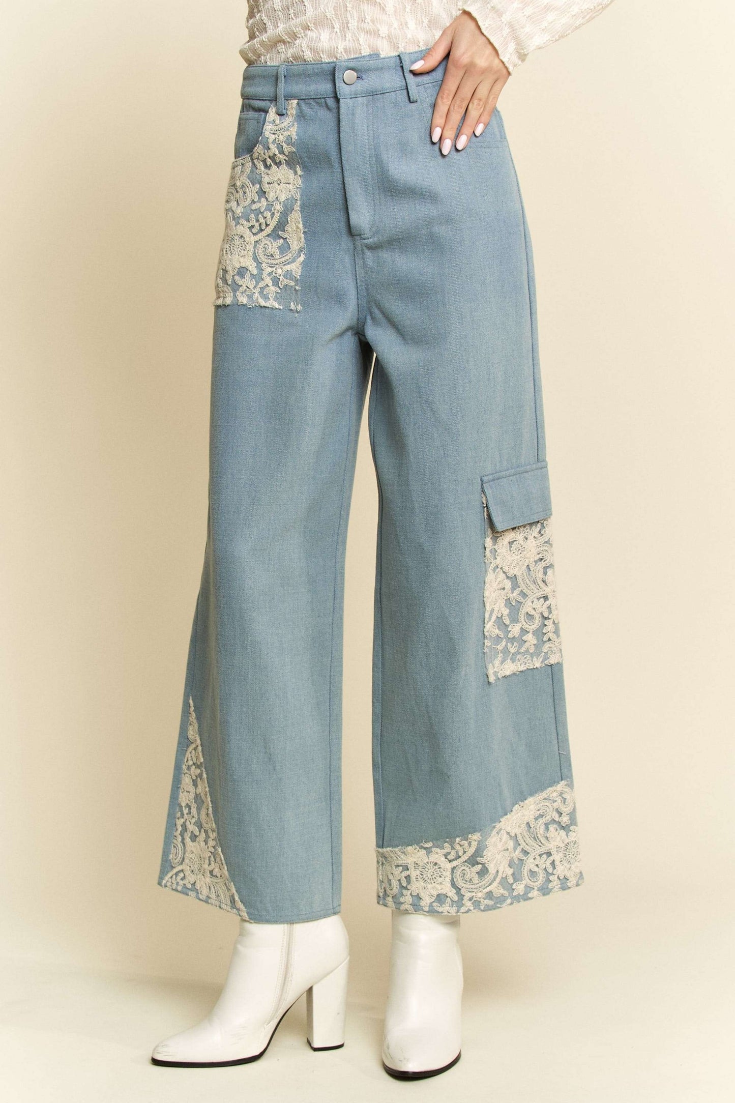 Davi & Dani Lace Applique Wide Leg JeansThese Lace Applique Wide Leg Jeans are the perfect statement piece for any fashion-forward individual. The delicate lace detailing adds a touch of femininity to thesDavi & Dani Lace Applique Wide Leg JeansDavi & Dani Lace Applique Wide Leg Jeans