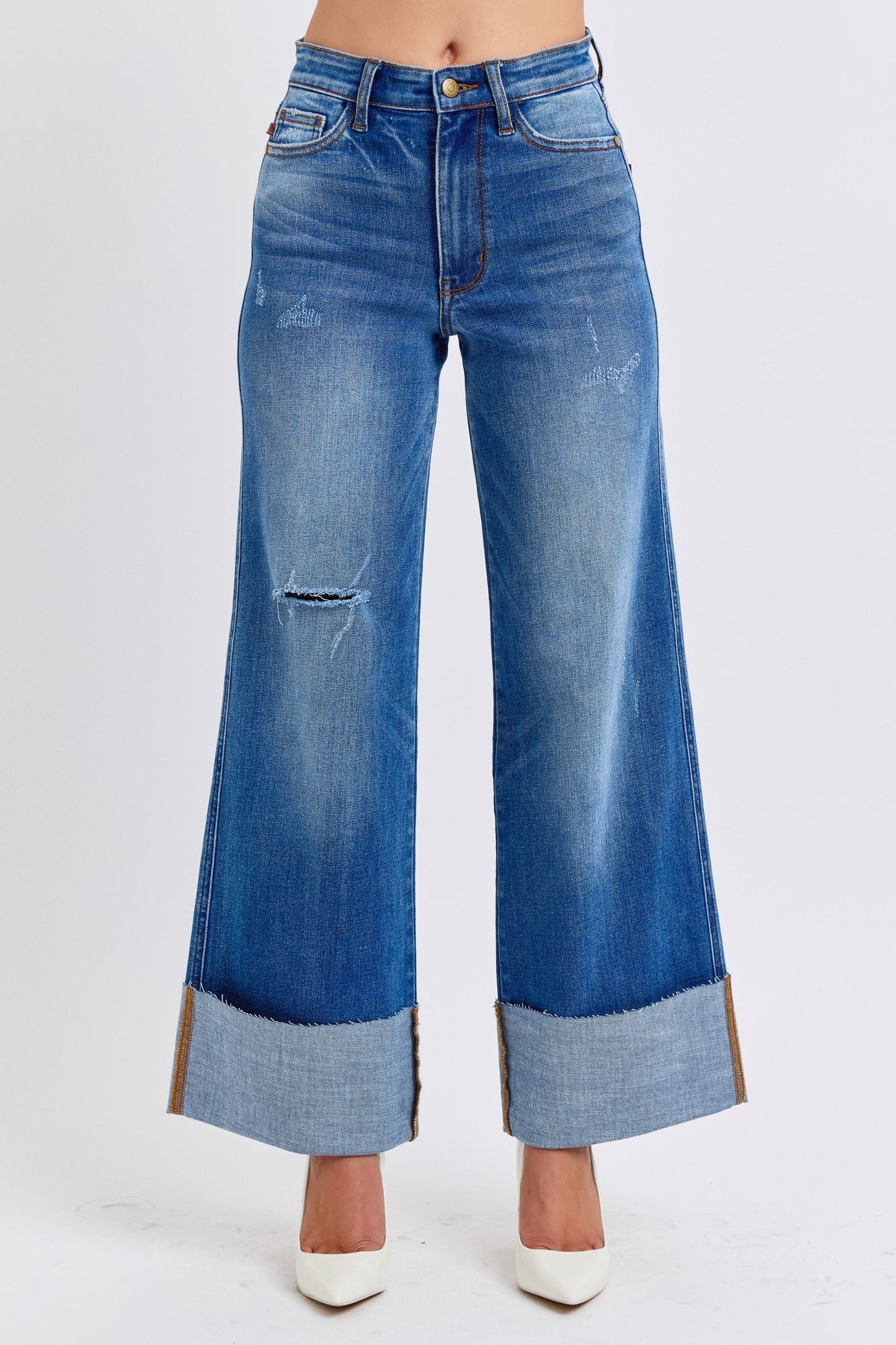 Judy Blue Full Size Distressed High Waist Wide Leg JeansThe Distressed High Waist Wide Leg Jeans are a stylish and on-trend choice for adding a touch of edge to your denim collection. The high waist design offers a flatteJudy Blue Full Size Distressed High Waist Wide Leg JeansJudy Blue Full Size Distressed High Waist Wide Leg Jeans