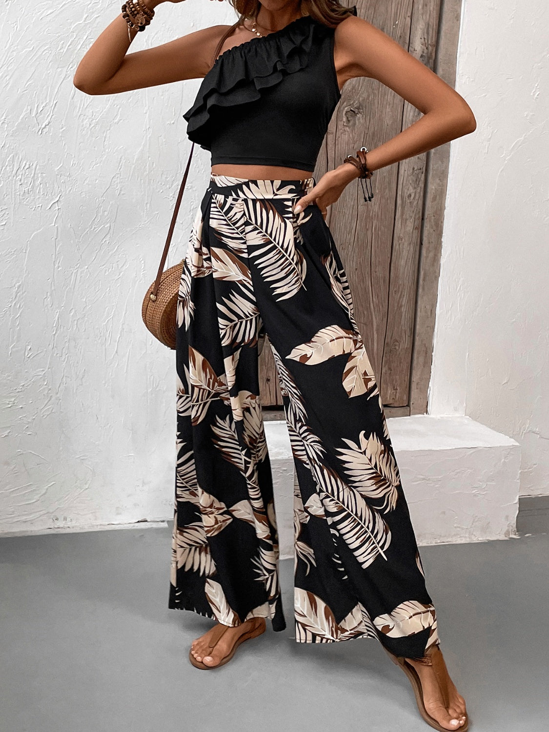 Honey Ruffled Sleeveless Top and Printed Pants SetFeatures: Ruffled
Number of pieces: Two-piece
Stretch: No stretch
Material composition: 95% polyester, 5% elastane
Care instructions: Machine wash cold. Tumble dry lHoney Ruffled Sleeveless TopDressesHoney Ruffled Sleeveless Top