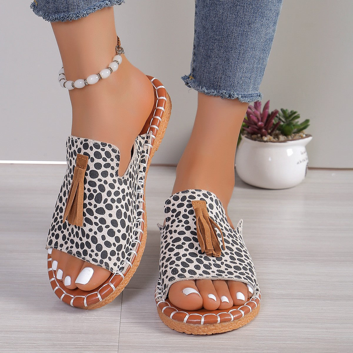 Fringe Leopard Open Toe SandalsUnleash your wild side with these Fringe Leopard Open Toe Sandals. Featuring a trendy leopard print and playful fringe accents, these open-toe sandals add a bold staFringe Leopard Open Toe SandalsFringe Leopard Open Toe Sandals