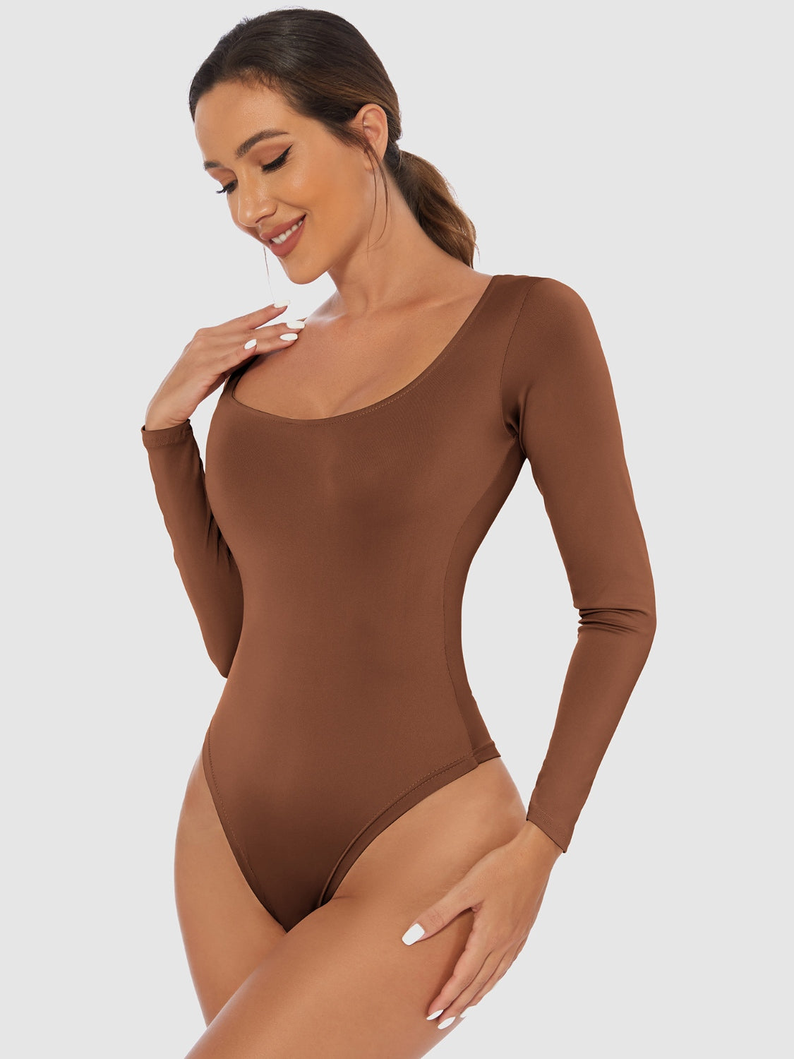 Full Size Scoop Neck Long Sleeve BodysuitFeatures: Basic style
Sheer: Opaque
Stretch: Slightly stretchy
Material composition: 65% polyester, 35% elastane
Care instructions: Machine wash cold. Tumble dry lowFull Size Scoop Neck Long Sleeve BodysuitFull Size Scoop Neck Long Sleeve Bodysuit