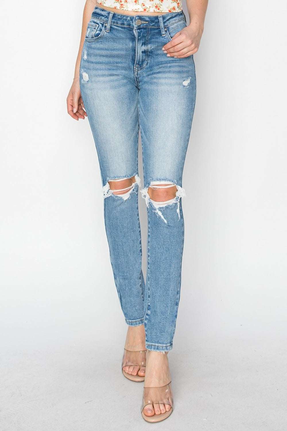 Risen Full Size High Rise Knee Distressed Skinny JeansThe High Rise Knee Distressed Skinny Jeans are a must-have for any fashion-forward wardrobe. Featuring a high-rise waist and skinny fit, these jeans offer a flatteriRisen Full Size High Rise Knee Distressed Skinny JeansRisen Full Size High Rise Knee Distressed Skinny Jeans