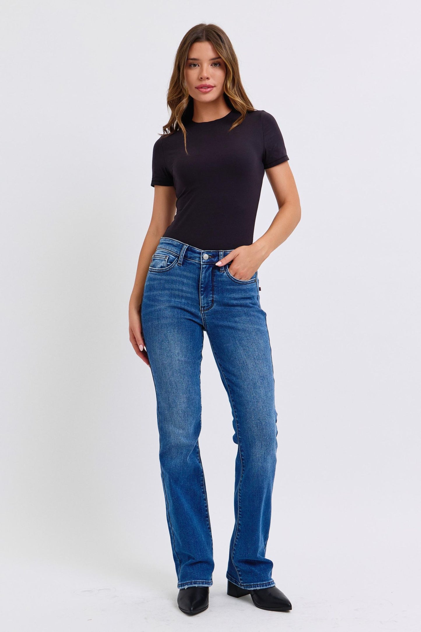 Judy Blue Full Size Run Mid-Rise Bootcut Jeans with Thermal LiningThe Mid-Rise Bootcut Jeans with thermal Lining are a versatile and timeless addition to any wardrobe. 
Featuring a mid-rise waist that offers a comfortable and flattJudy Blue Full Size Run Mid-Rise Bootcut JeansPantsJudy Blue Full Size Run Mid-Rise Bootcut Jeans