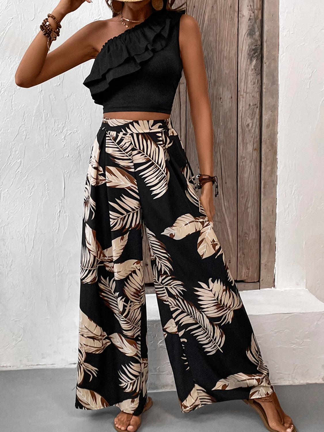 Honey Ruffled Sleeveless Top and Printed Pants SetFeatures: Ruffled
Number of pieces: Two-piece
Stretch: No stretch
Material composition: 95% polyester, 5% elastane
Care instructions: Machine wash cold. Tumble dry lHoney Ruffled Sleeveless TopDressesHoney Ruffled Sleeveless Top