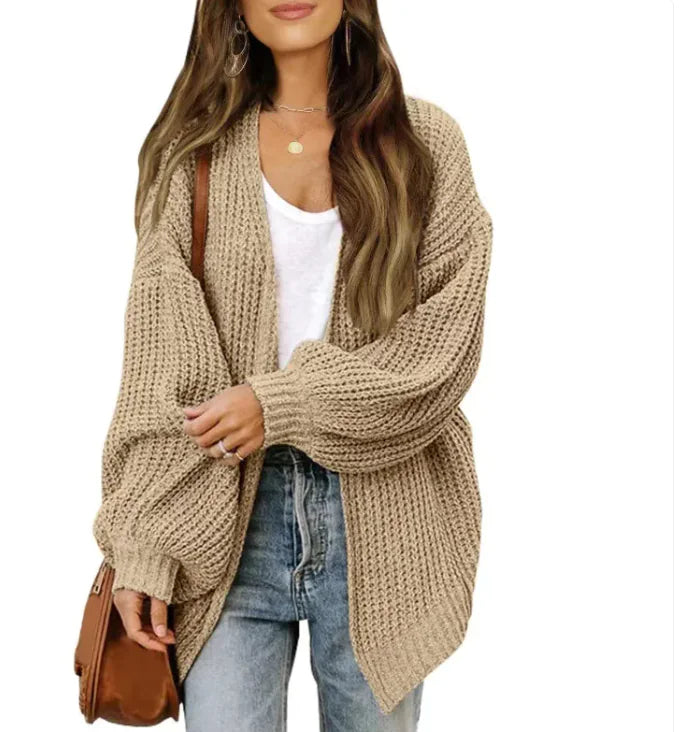 Loose Retro Sweater Coat Women's Mid-length Knitted CardiganCozy up in style with our Loose Retro Sweater Coat! Designed for modern women who love a touch of vintage flair, this mid-length knitted cardigan combines comfort anLoose Retro Sweater Coat Women'Loose Retro Sweater Coat Women'