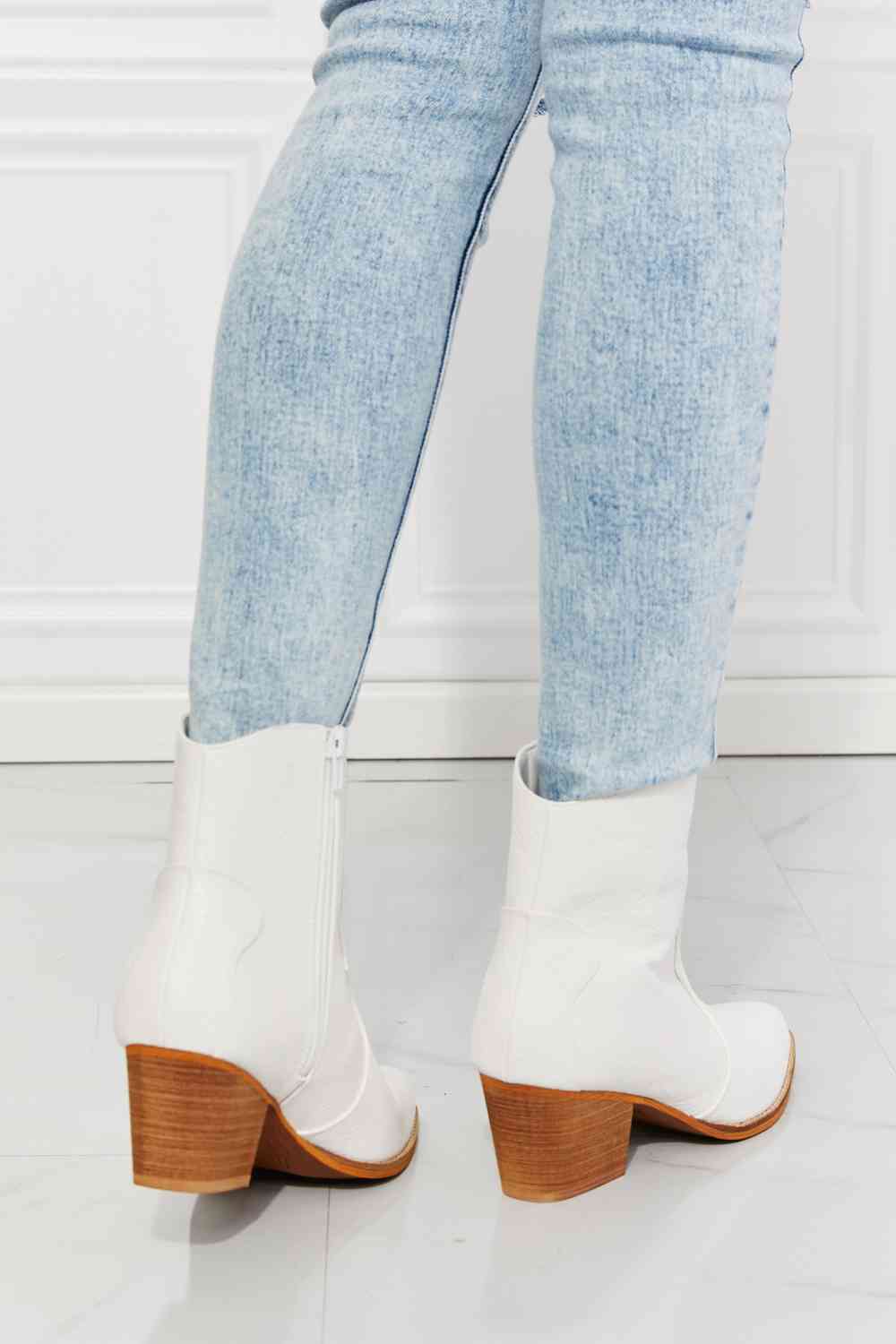 MMShoes Watertower Town Faux Leather Western Ankle Boots in WhiteThese Western-inspired booties feature a stacked heel and a faux leather upper. Their pointed toe adds a refined detail, making these a perfect choice to finish any chelsea boots womenchelsea boots women